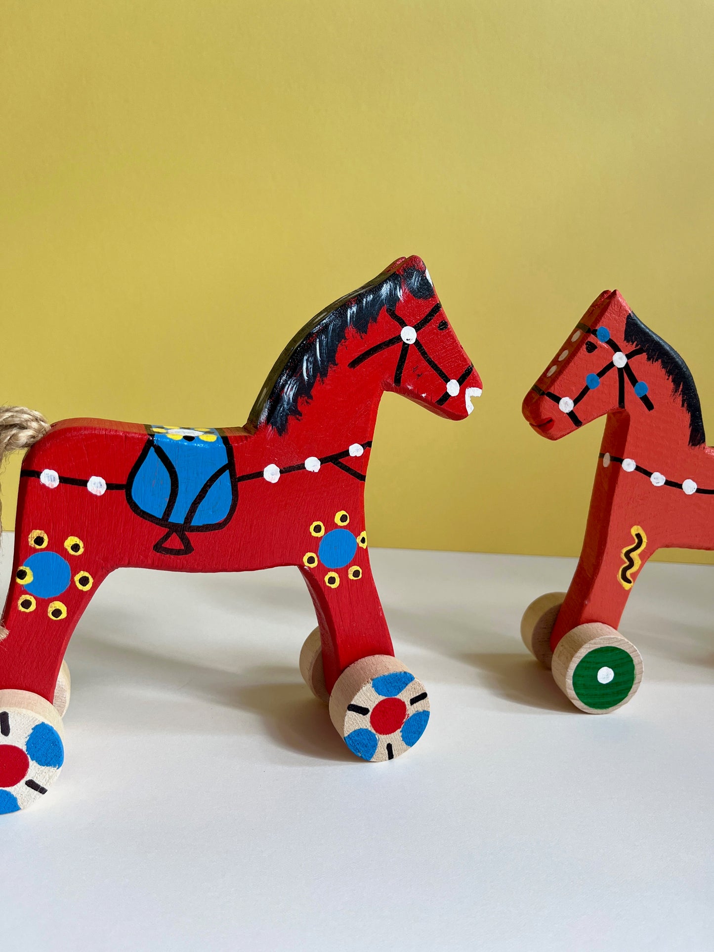 Red Horse Push In Toy by Wlodzimierz
