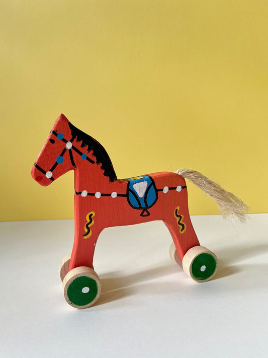 Coral Horse Push In Toy by Wlodzimierz