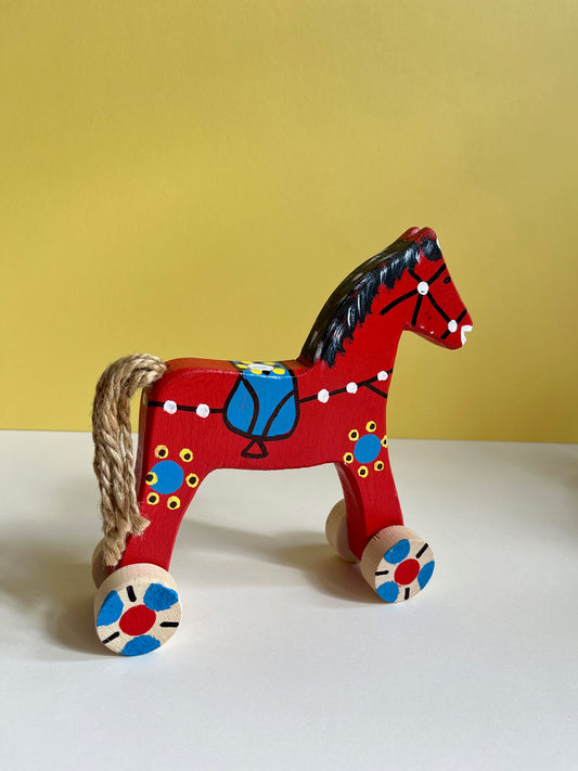 Red Horse Push In Toy by Wlodzimierz