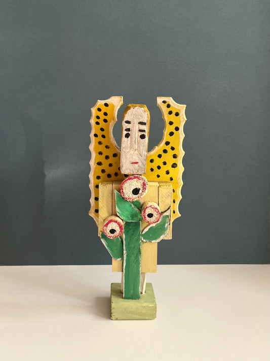 Wooden Figure with a Flower by Dionizy