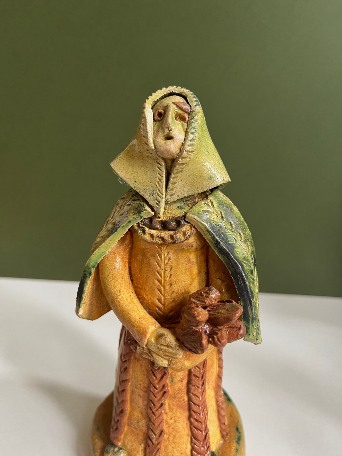 Ceramic Woman with Herbs by Radoslaw