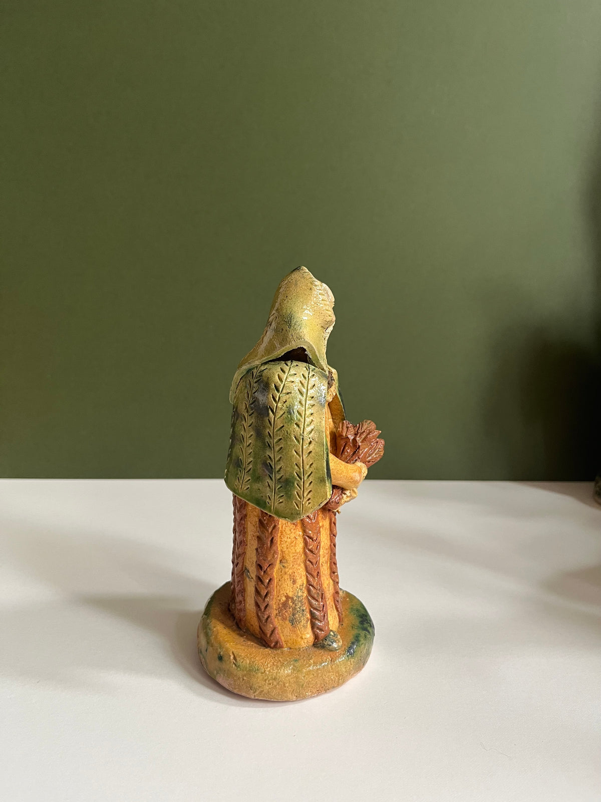 Ceramic Woman with Herbs by Radoslaw