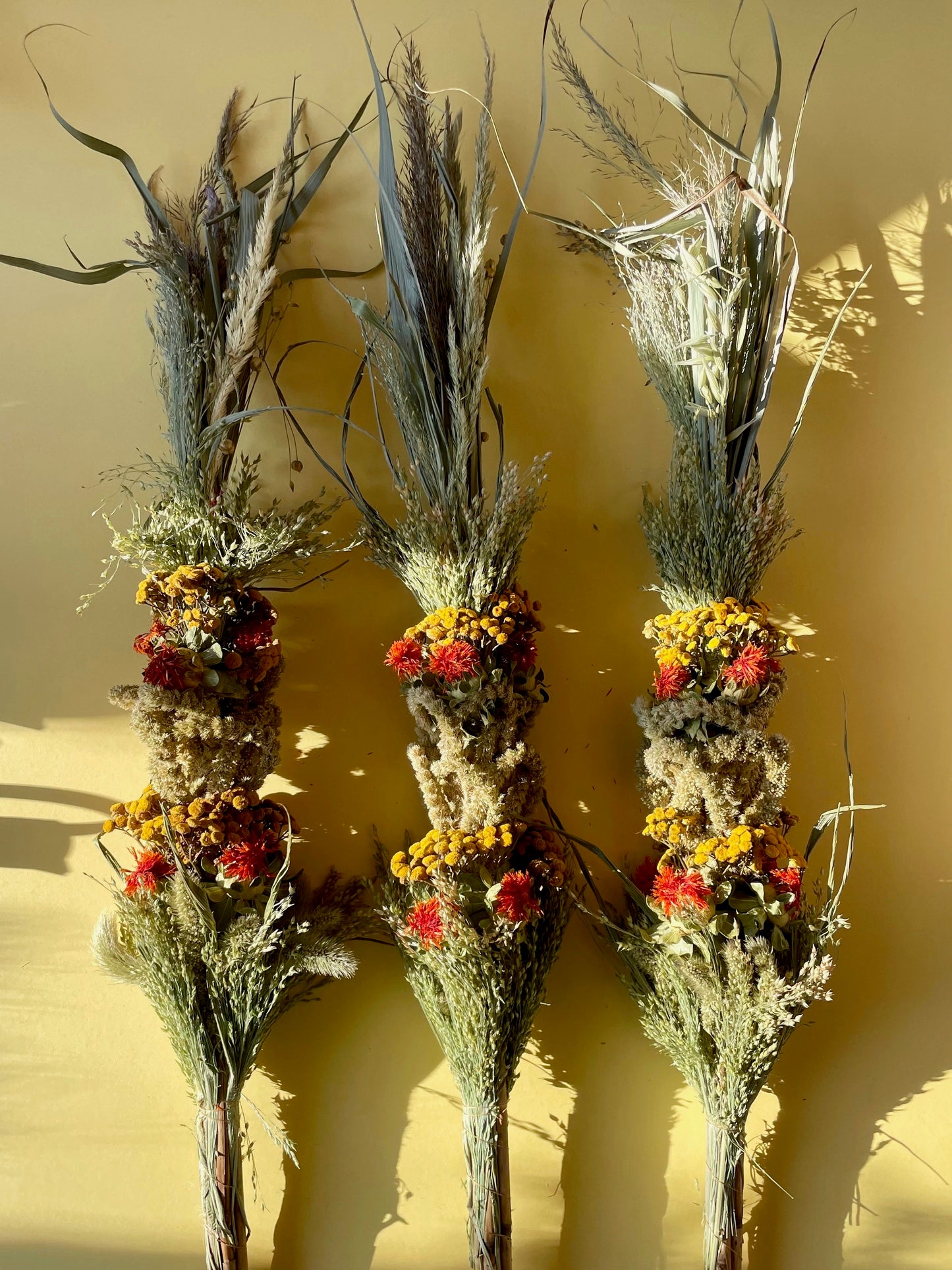 Easter Palm with Dried Yellow Achillea and Orange Safflowers