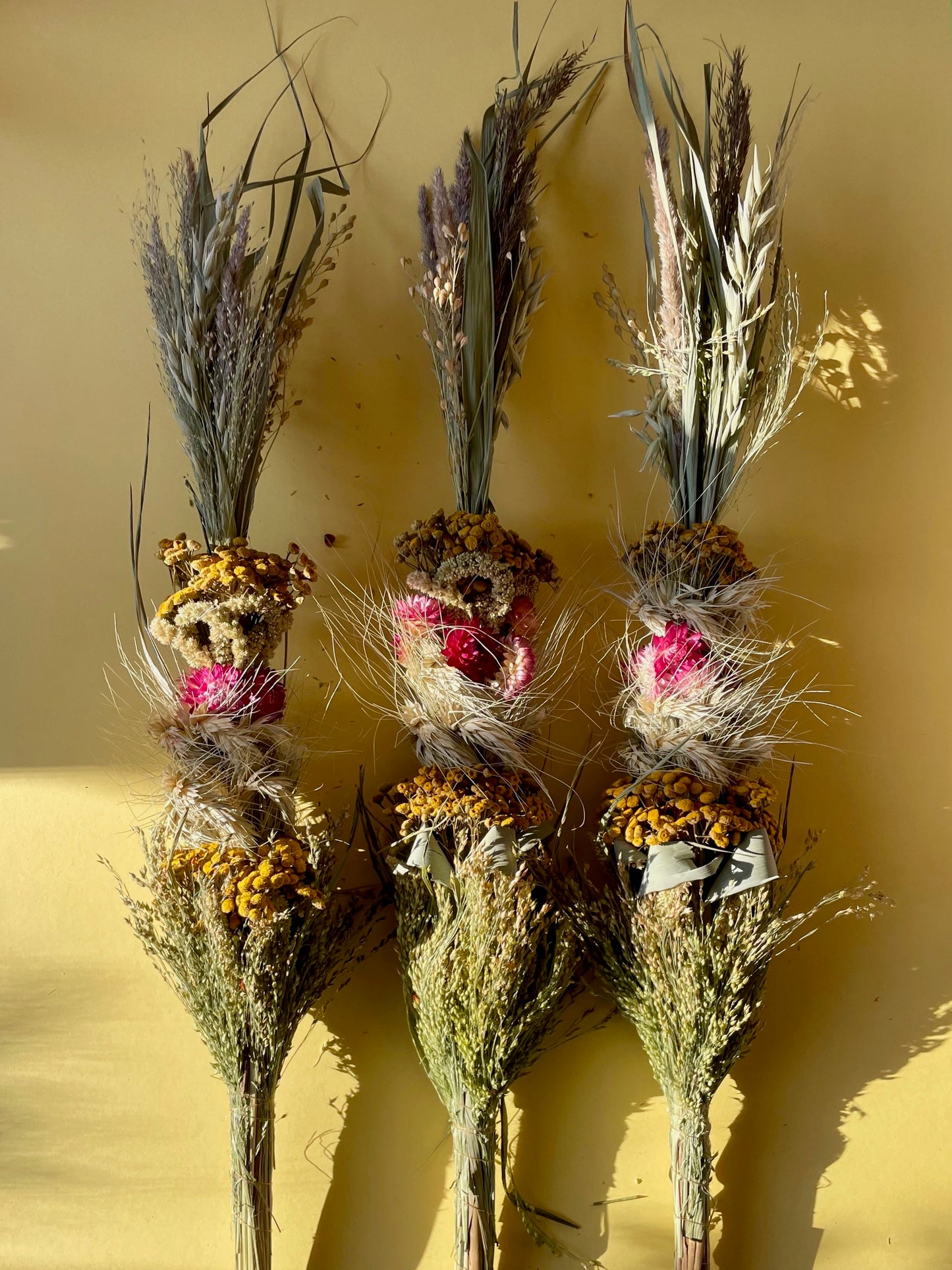 Easter Palm with Pink Strawflowers and Yellow Achillea