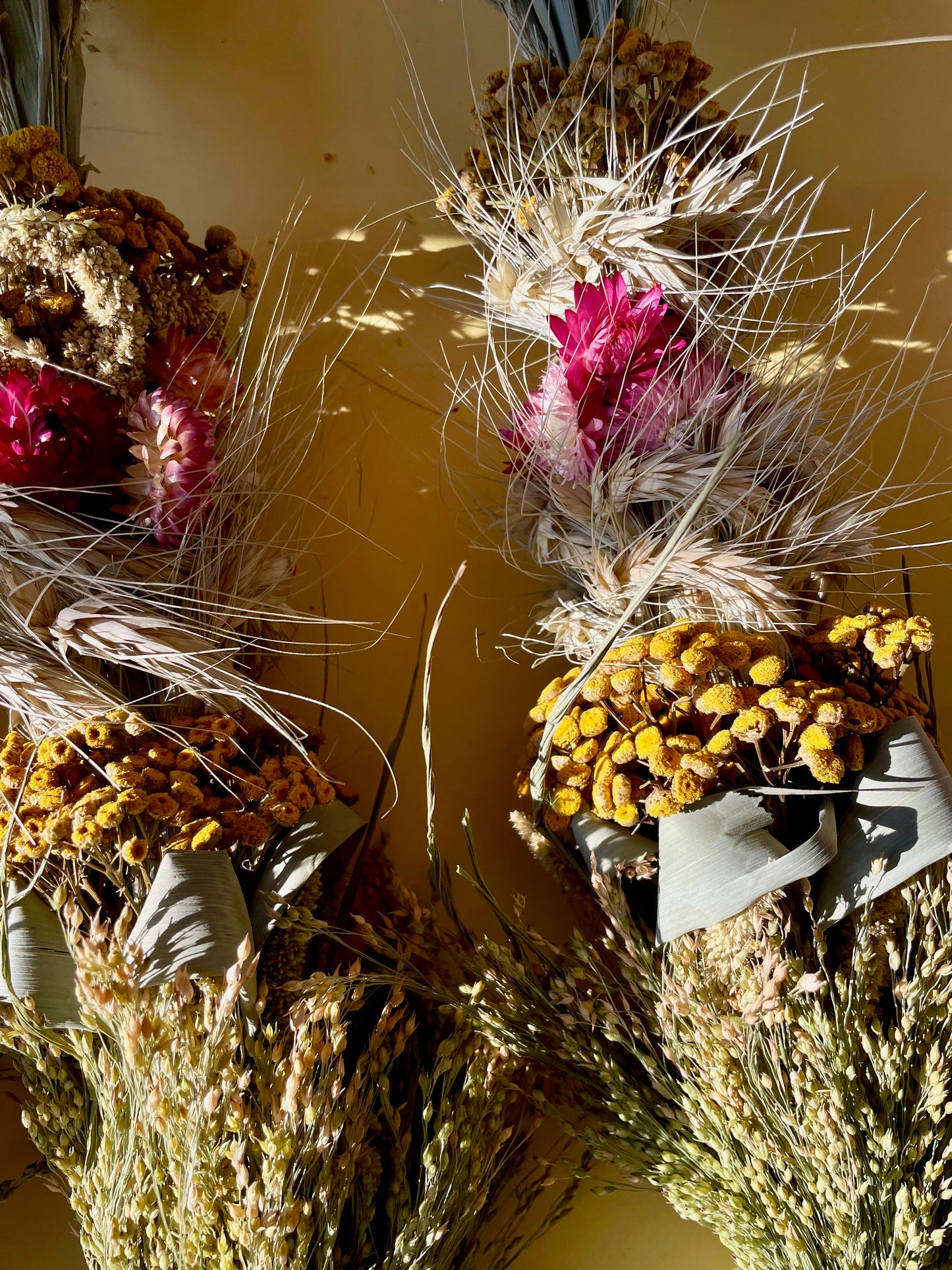 Easter Palm with Pink Strawflowers and Yellow Achillea