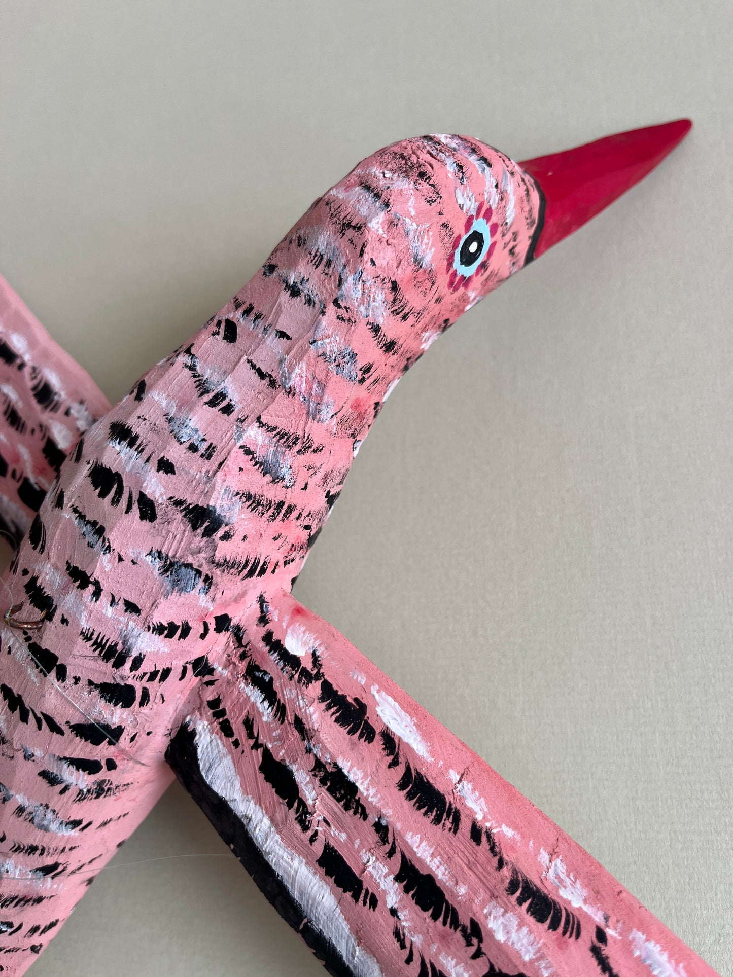 Hanging Wooden Bird in Pink by Eugeniusz