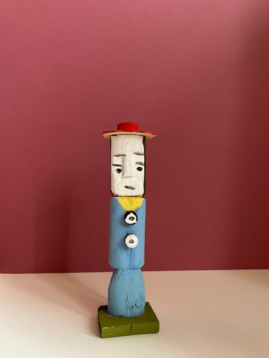 Figure with a Red Hat by Dionizy