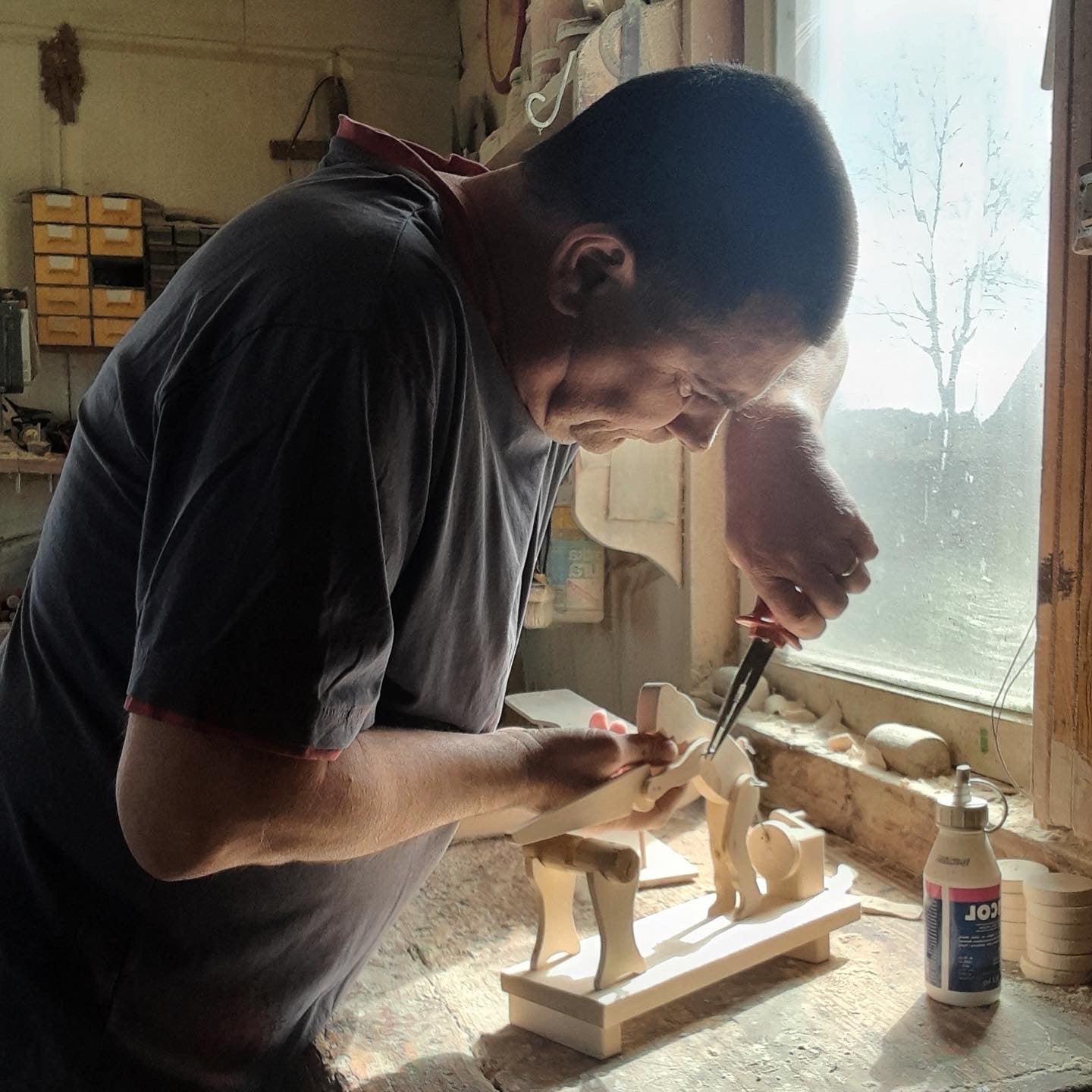 Man Cutting Wood Kinetic Wooden Toy