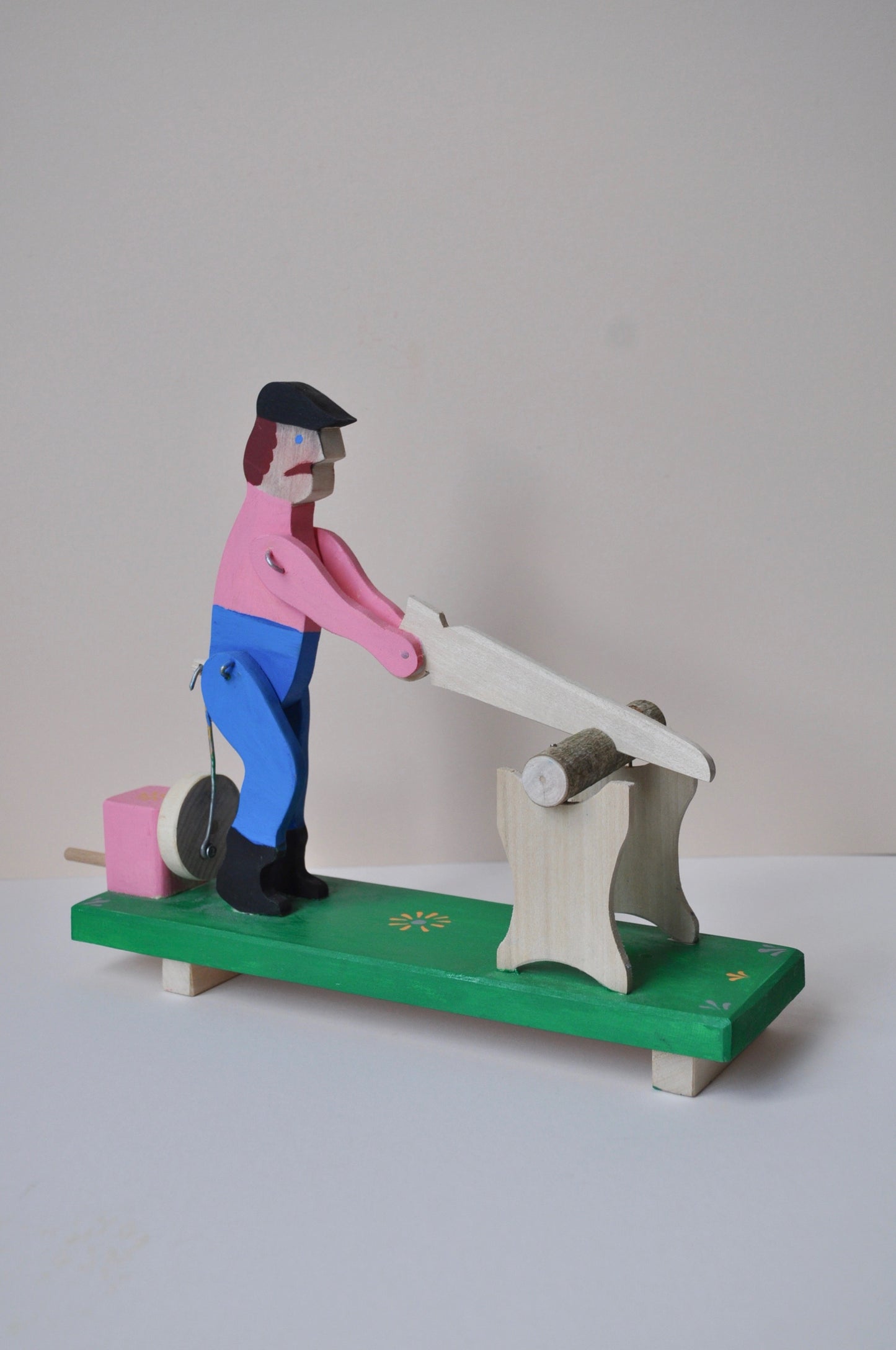 Man Cutting Wood Kinetic Wooden Toy