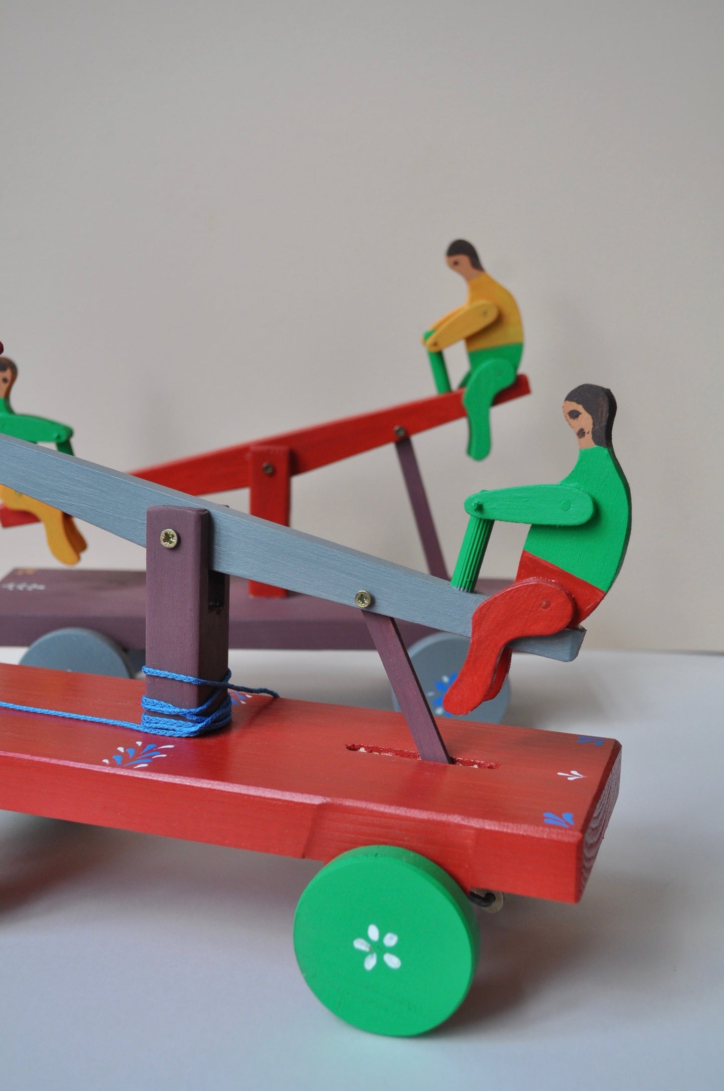 People on Swing Wooden Toy