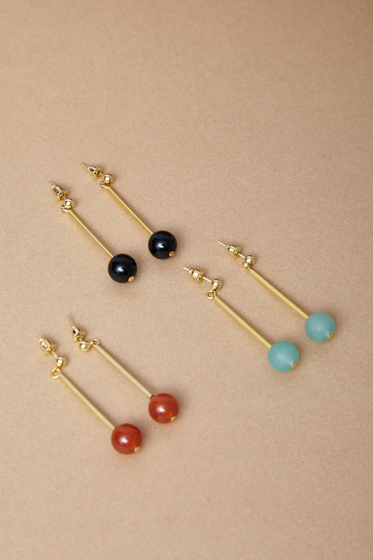 Dangling Earrings by Brass and Bold